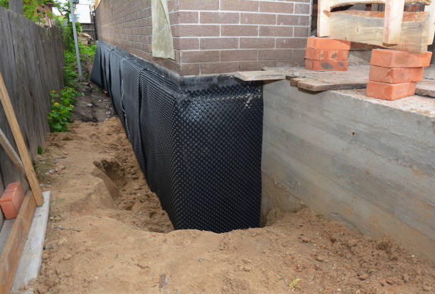 Happy homeowners after waterproofing job in Culpeper